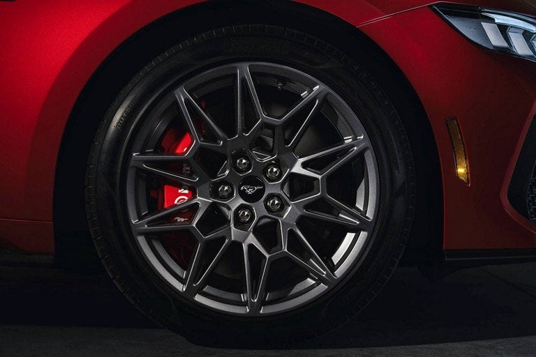 2024 Ford Mustang® model with a close-up of a wheel and brake caliper | Tubbs Brothers, Inc in Sandusky MI